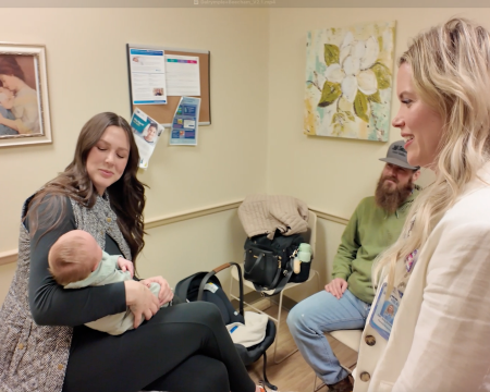 Parents in exam room with Dr. Dalrymple