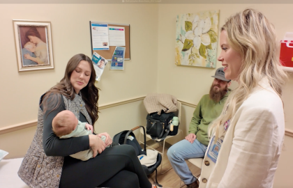 Parents in exam room with Dr. Dalrymple
