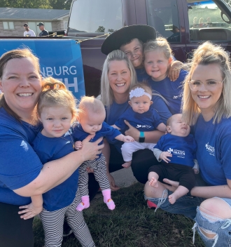 Staff and their kids at the parade