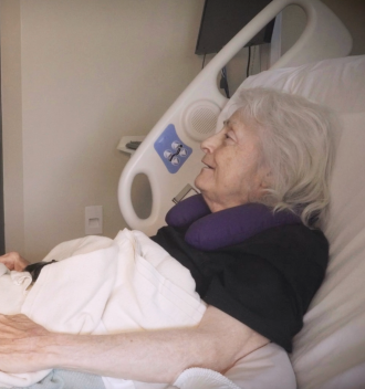 Nurse visiting with patient