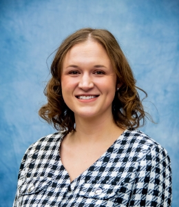Andrea Randecker pictured in a black and white checked button-down shirt